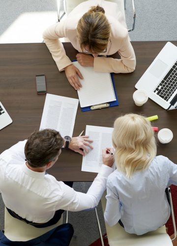 Top view of professional investment advisor woman consulting about financial plan with business management.